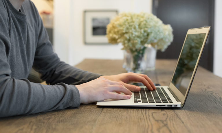 Person working on a laptop