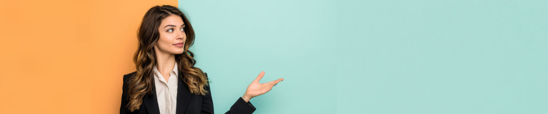 Woman in front of a teal and orange backdrop in a presenting pose