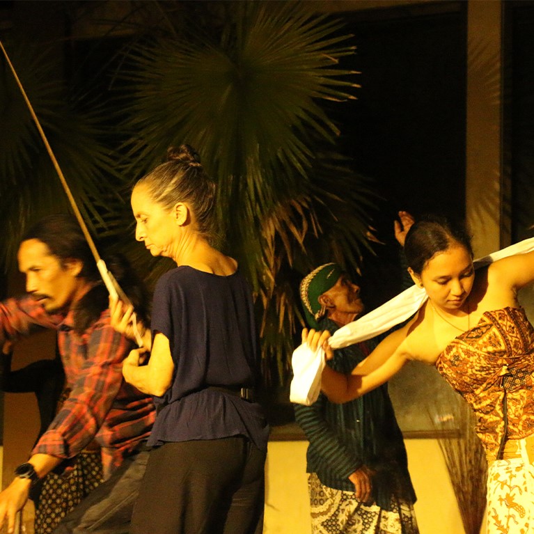 four people dancing