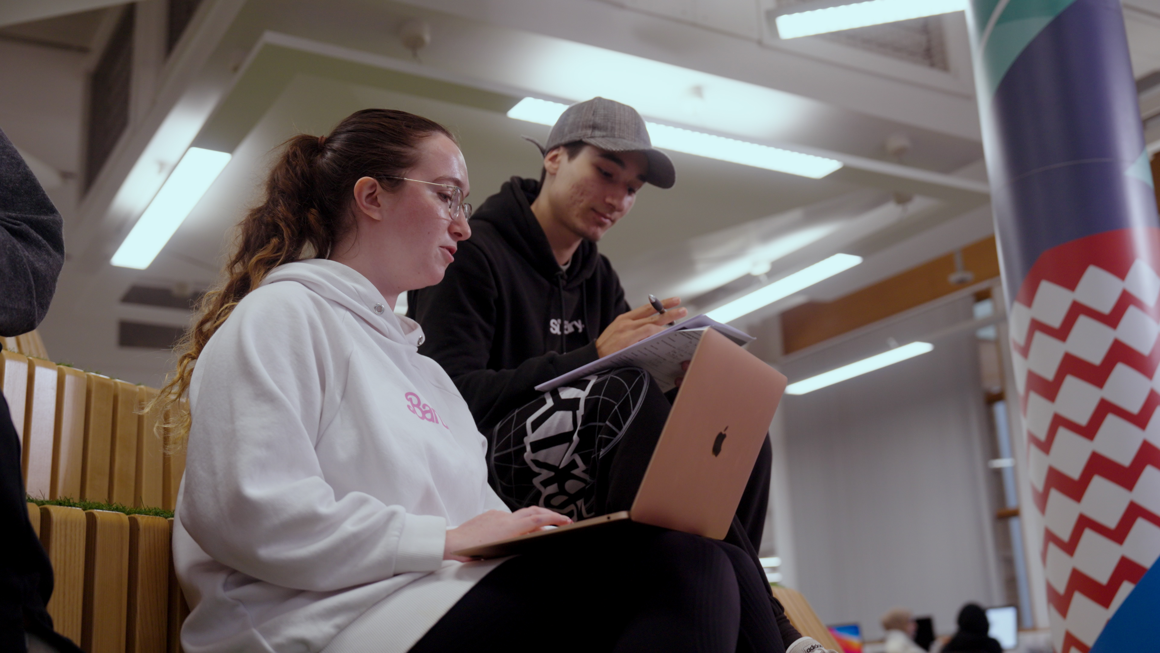 Students sitting together in library