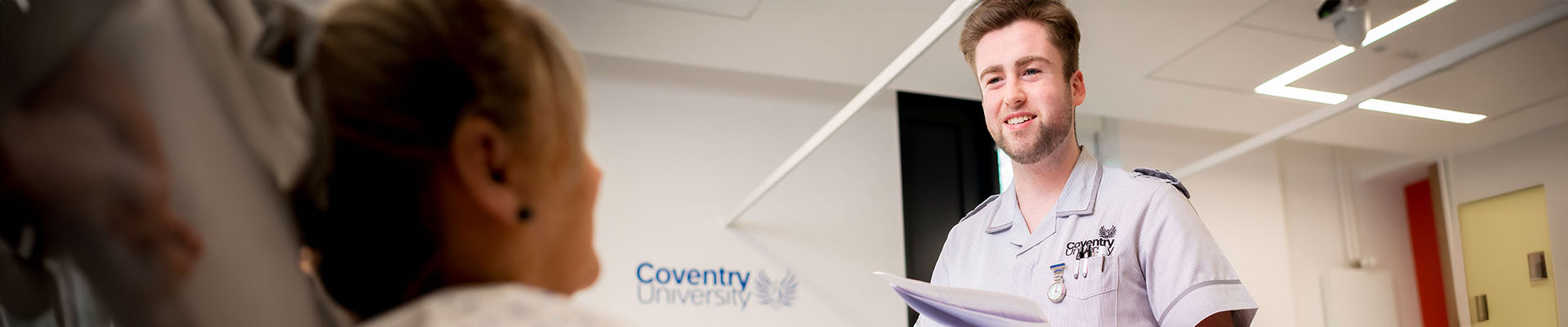 Nurse tending to a patient