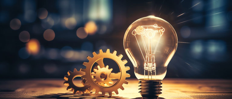 lightbulb and gears representing idea