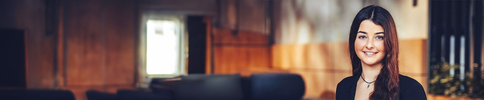 Student smiling looking directly forward