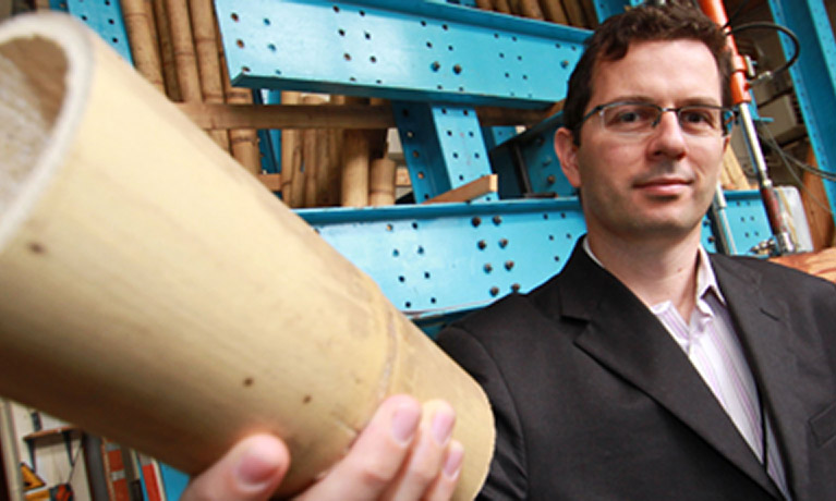 David Trujillo - white male with glasses with bamboo in his hand