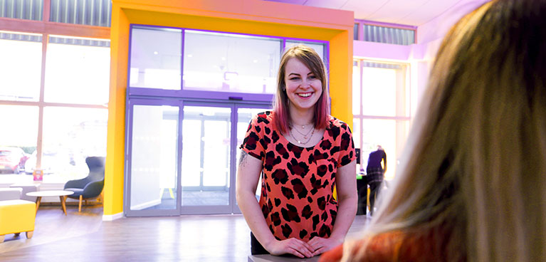 Student at the Customer Services desk