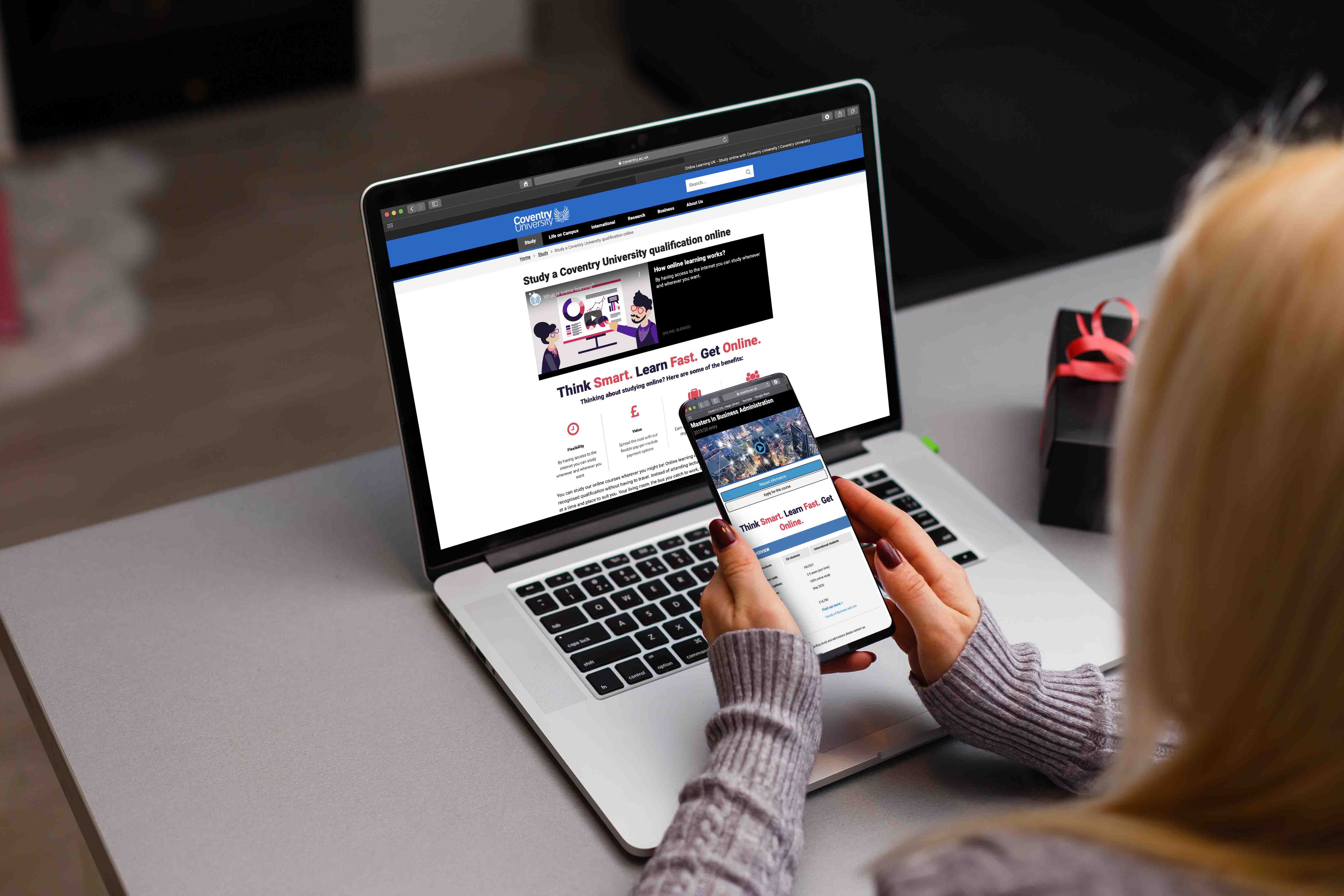 woman looking at Coventry University website