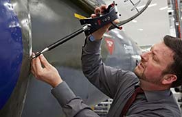 Engineer working on the outside of a plane