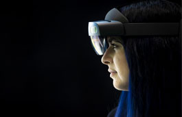 Female student wearing a virtual reality headset