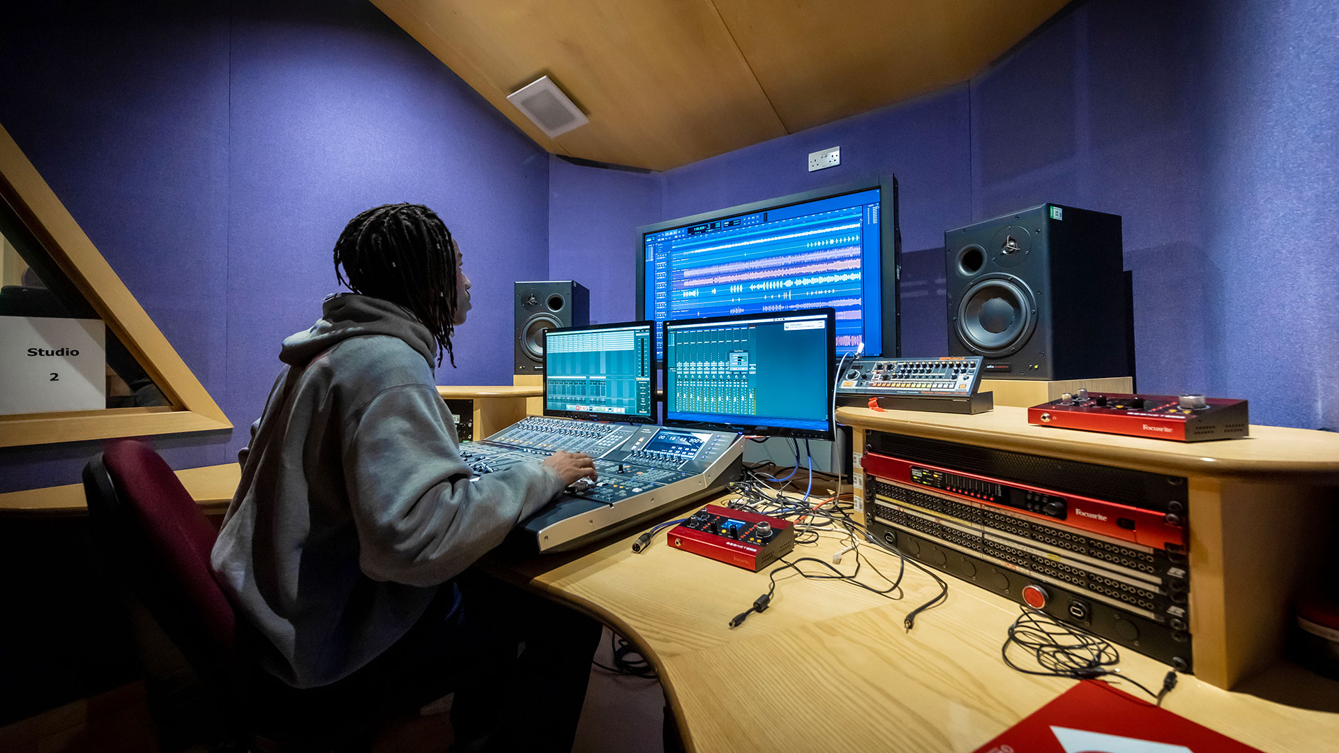 Student using recording studio