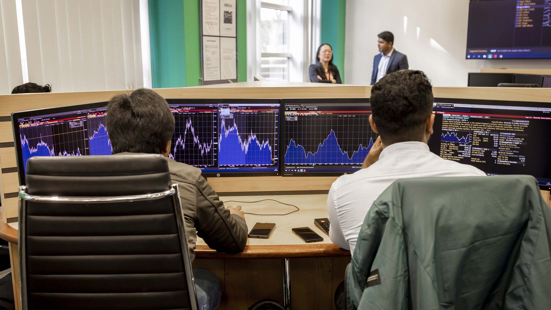 Two students working in the Trading Floor