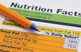 Close up of nutrition factsheet and pen