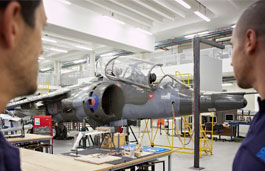 students next to the harrier jet at Coventry University