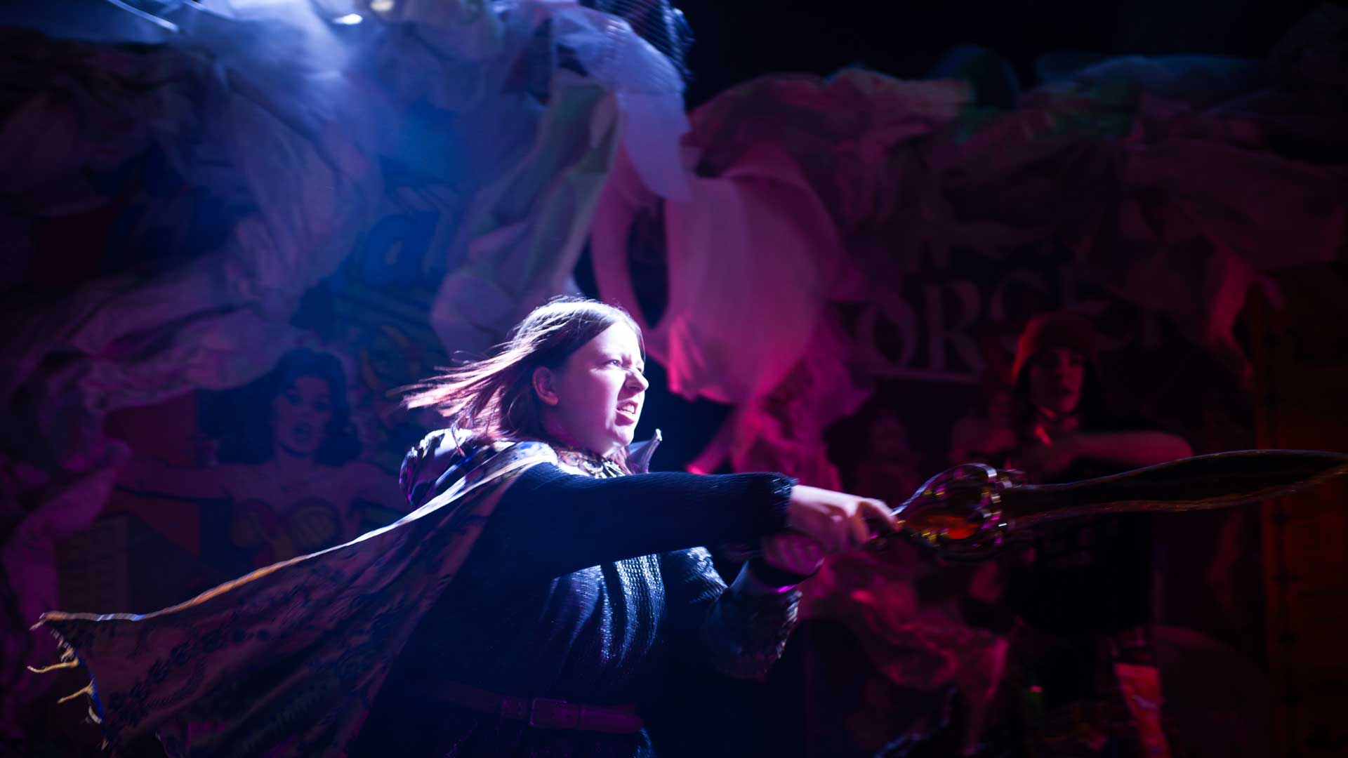 a student acting in a stage production