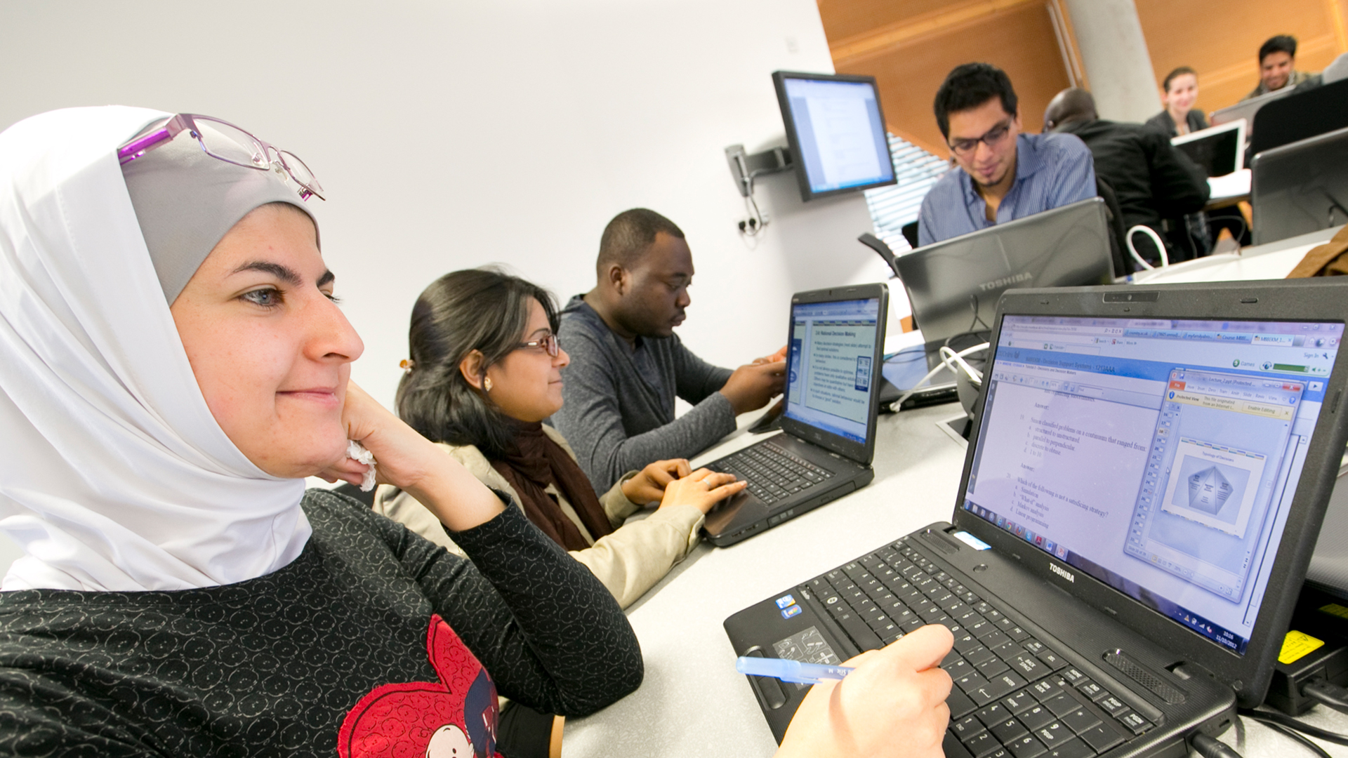 Students working on laptops