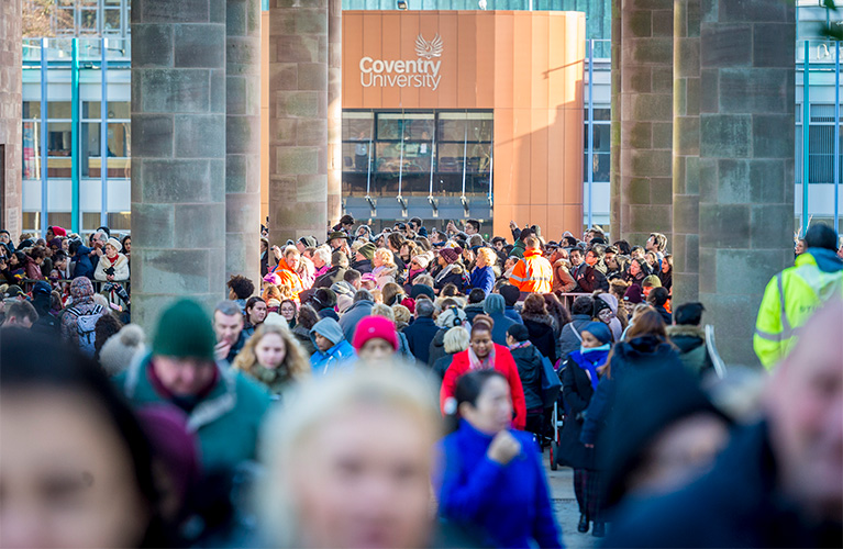 Crowds outside the Alan Berry building