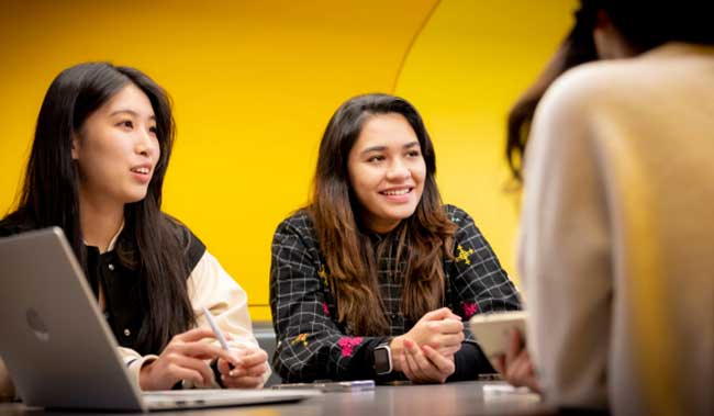 Group of students sitting at a table