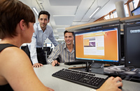 A student working in an open access computer suite.