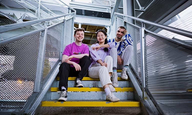 Three students in FarGo Village in Coventry city.