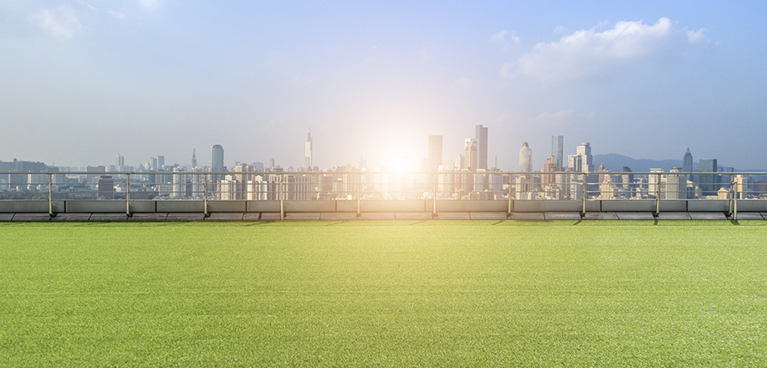 Sunny cityscape with glare in the centre