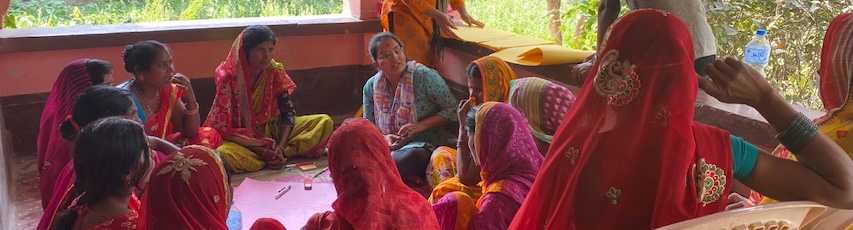 Muslin women sitting in a teaching environment