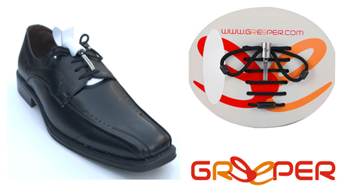 A black smart shoe with a Greeper shoe lace