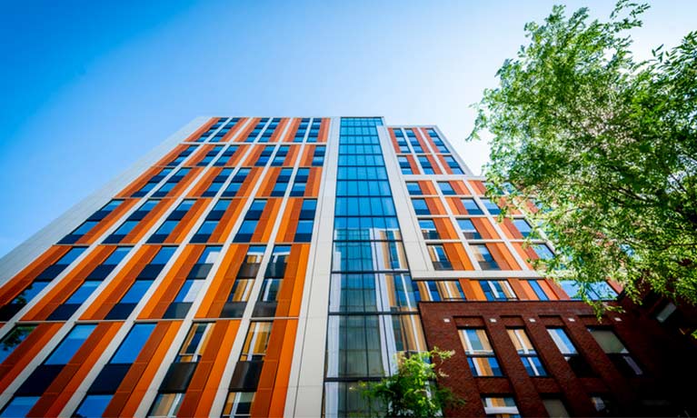 A worms eye view of an accommodation building