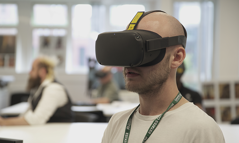 Student trying on a VR headset