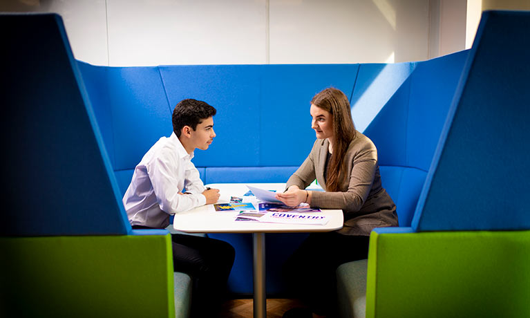 Two students working in the Digicomm Lab