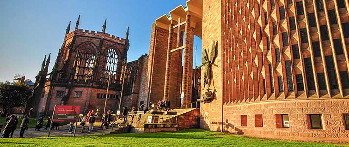 Outside of Coventry Cathedral ruins on a summers day