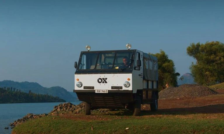 large truck sitting on river bank