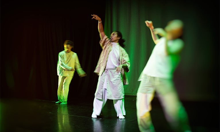 Three people dancing