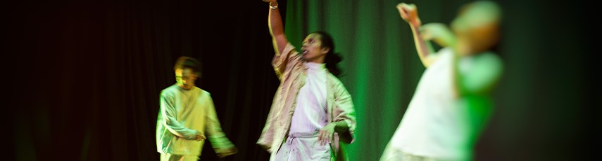 three people dancing