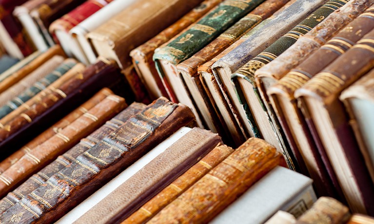 Old books in a bookcase