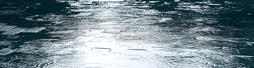 Flooded rainy street pavement