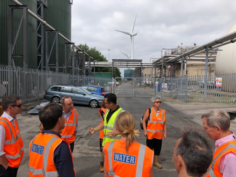 group on people on site in high visibility vests