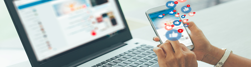 A businesswoman using social media on a smartphone