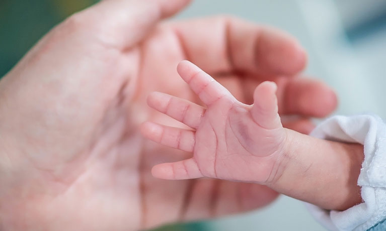 baby hand outstretched