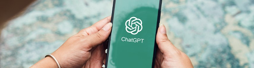 Person holding a phone using Chat GPT