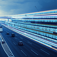 A busy highway with an overlay of binary numbers