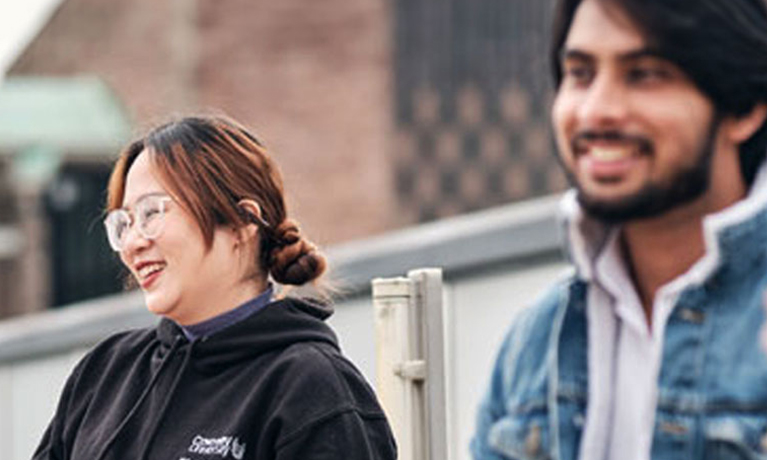 Students sitting together at a table 