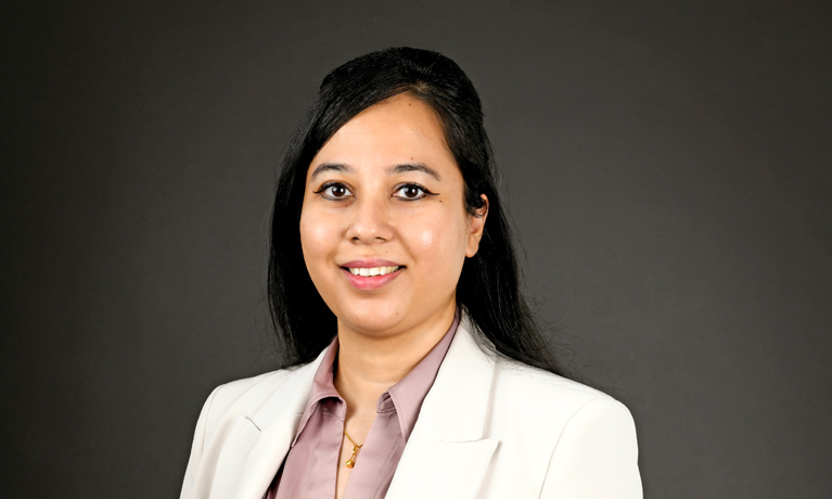 A headshot of Yashodhara Dasgupta.
