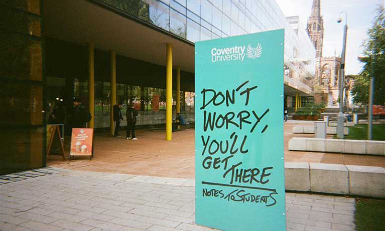 Andy Leek note on a billboard