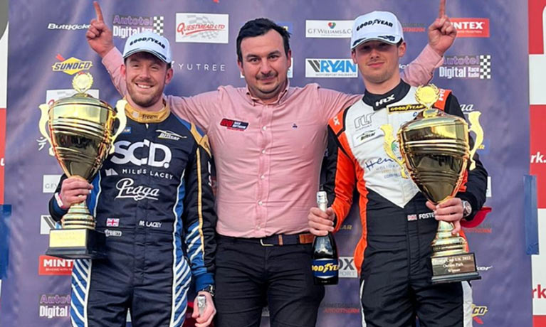 Raoul on a podium winning a trophy