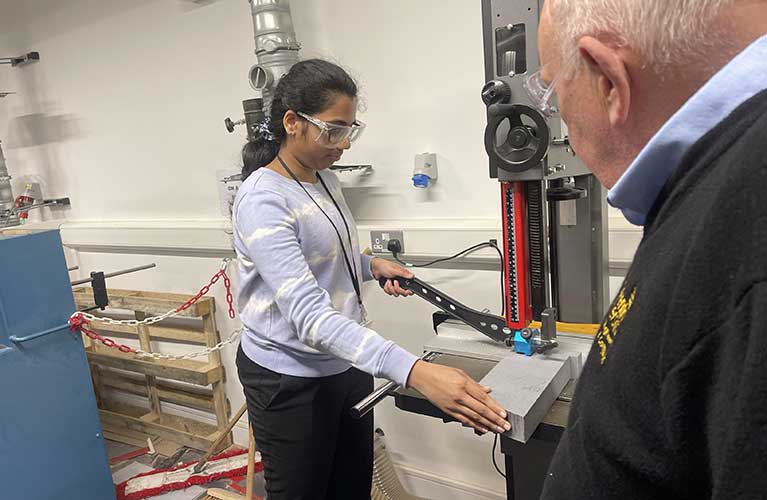 Sri Anshula Chennareddy working in an engineering lab