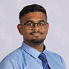 Rangeshh Thiyaharajhan smiling