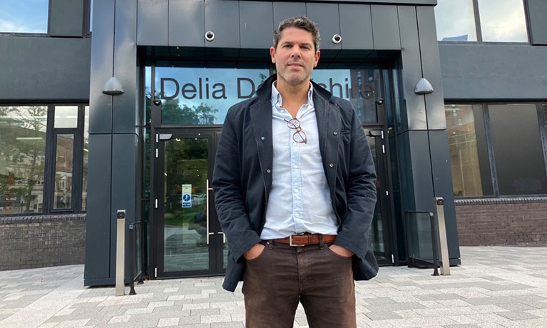 Matt Hill standing outside Delia Derbyshire building