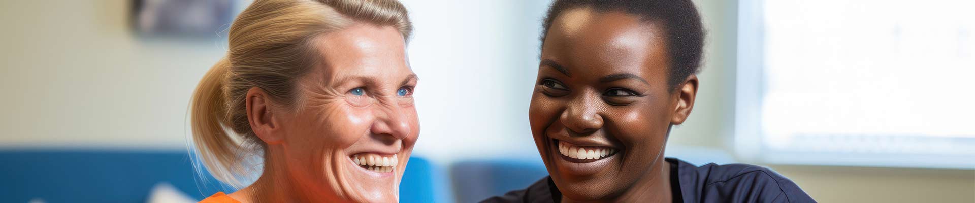 Occupational Therapists smiling together in uniform