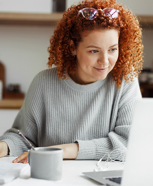 woman sitting at a desk