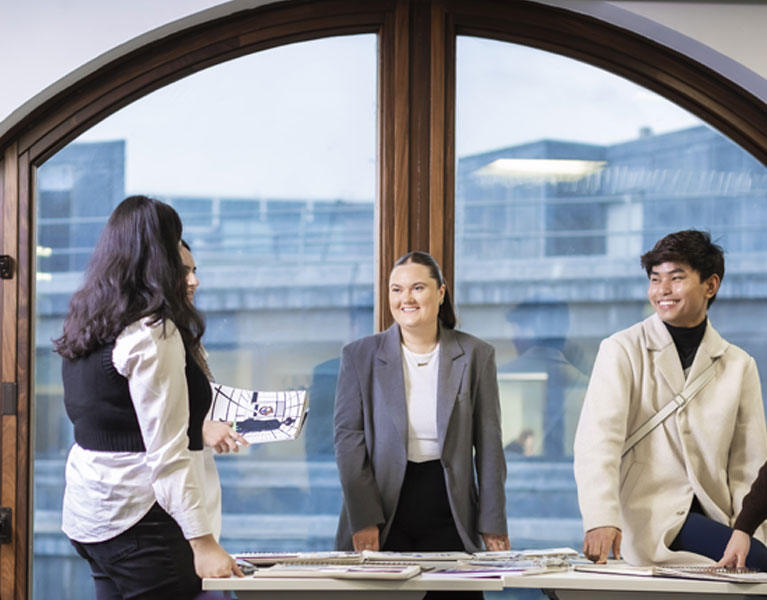 students sitting together in an office space