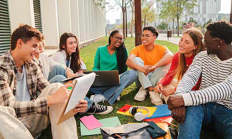 Group of students standing in the Cathedral ruins 